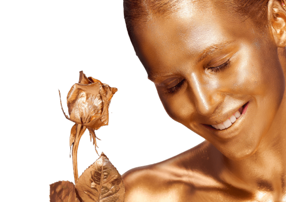 woman covered with gold paint holding rose